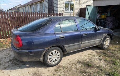 Mitsubishi Carisma I, 1999 год, 385 000 рублей, 6 фотография