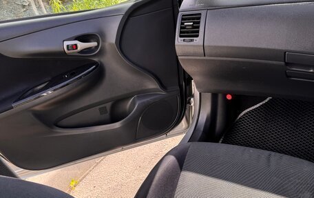 Toyota Corolla, 2011 год, 900 000 рублей, 10 фотография