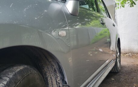 Nissan Tiida, 2010 год, 900 000 рублей, 9 фотография