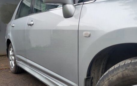 Nissan Tiida, 2010 год, 900 000 рублей, 8 фотография