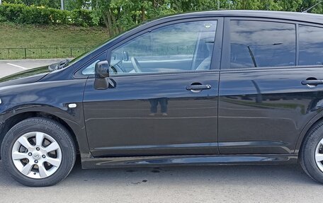 Nissan Tiida, 2010 год, 800 000 рублей, 6 фотография