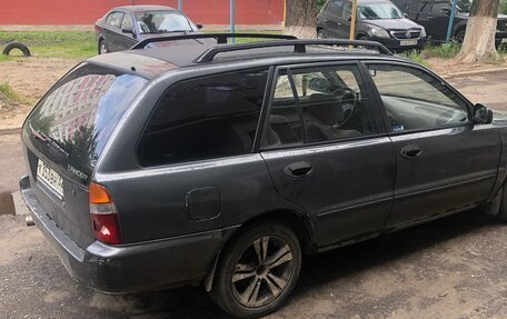 Mitsubishi Lancer VII, 1994 год, 135 000 рублей, 5 фотография