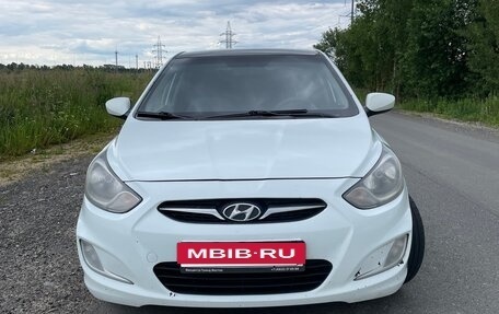 Hyundai Solaris II рестайлинг, 2011 год, 630 000 рублей, 12 фотография