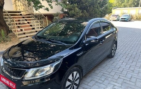 KIA Rio III рестайлинг, 2011 год, 830 000 рублей, 7 фотография