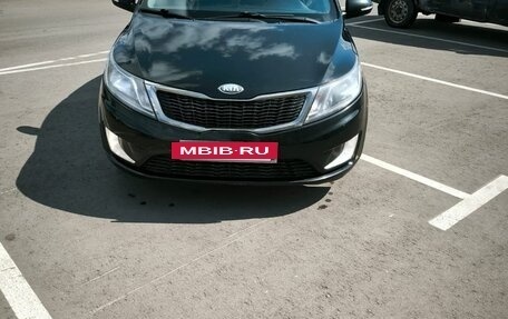KIA Rio III рестайлинг, 2013 год, 750 000 рублей, 20 фотография