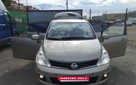 Nissan Tiida, 2010 год, 690 000 рублей, 9 фотография