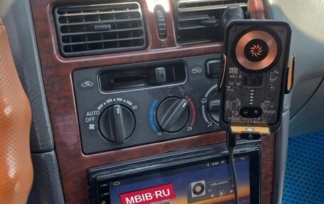 Toyota Avensis III рестайлинг, 1998 год, 315 000 рублей, 17 фотография
