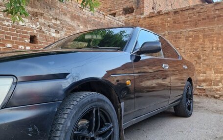 Nissan Laurel VIII, 2001 год, 550 000 рублей, 31 фотография