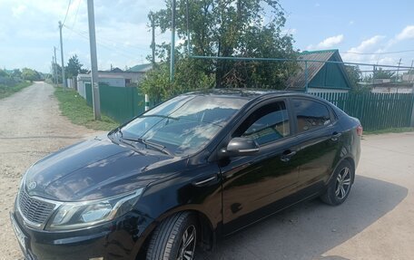 KIA Rio III рестайлинг, 2012 год, 700 000 рублей, 10 фотография