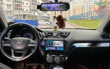 KIA Rio III рестайлинг, 2011 год, 900 000 рублей, 10 фотография