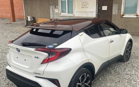 Toyota C-HR I рестайлинг, 2019 год, 2 450 000 рублей, 31 фотография