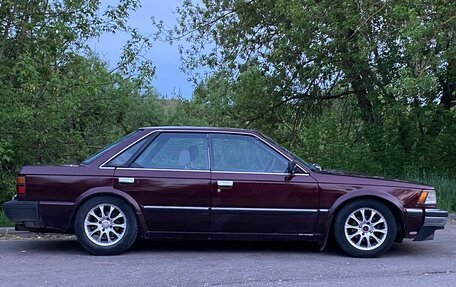 Nissan Bluebird VIII, 1987 год, 300 000 рублей, 6 фотография