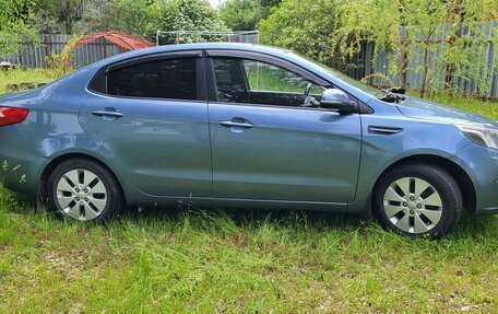 KIA Rio III рестайлинг, 2012 год, 660 000 рублей, 3 фотография