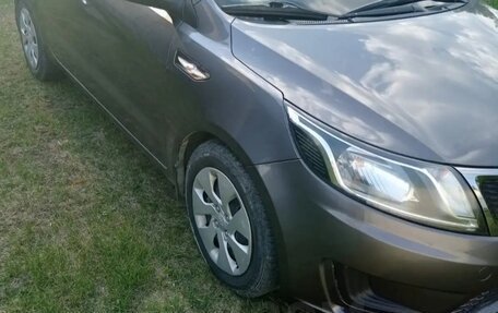 KIA Rio III рестайлинг, 2012 год, 930 000 рублей, 2 фотография