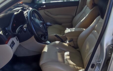 Toyota Avensis III рестайлинг, 2004 год, 1 000 000 рублей, 9 фотография