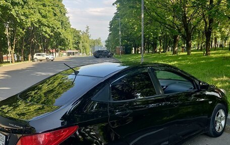 Hyundai Solaris II рестайлинг, 2011 год, 630 000 рублей, 5 фотография