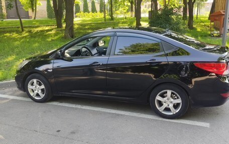 Hyundai Solaris II рестайлинг, 2011 год, 630 000 рублей, 10 фотография