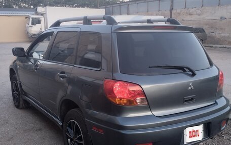 Mitsubishi Outlander III рестайлинг 3, 2003 год, 700 000 рублей, 12 фотография