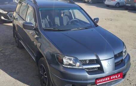 Mitsubishi Outlander III рестайлинг 3, 2003 год, 700 000 рублей, 15 фотография