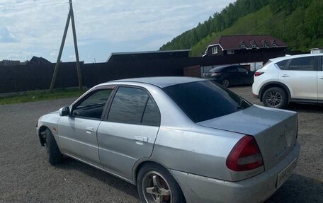 Mitsubishi Mirage VI рестайлинг, 1997 год, 220 000 рублей, 2 фотография