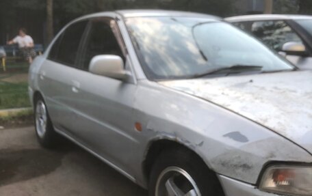 Mitsubishi Mirage VI рестайлинг, 1997 год, 220 000 рублей, 5 фотография