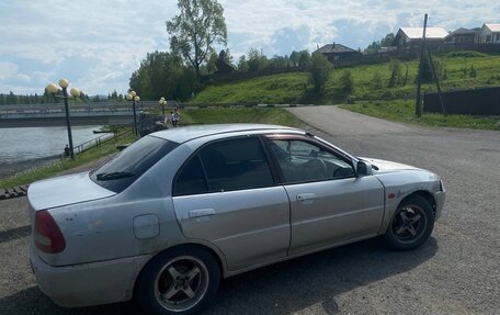 Mitsubishi Mirage VI рестайлинг, 1997 год, 220 000 рублей, 7 фотография