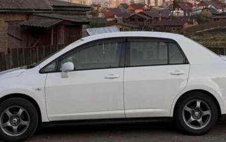 Nissan Tiida, 2009 год, 680 000 рублей, 10 фотография