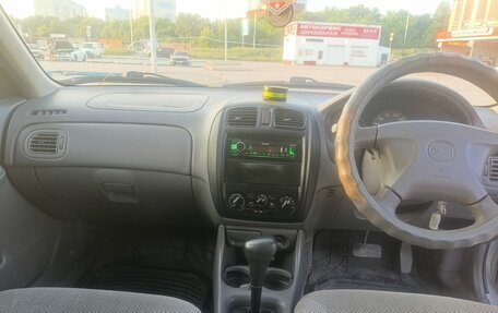Mazda Familia, 1998 год, 350 000 рублей, 28 фотография