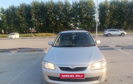Mazda Familia, 1998 год, 350 000 рублей, 24 фотография