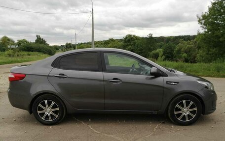 KIA Rio III рестайлинг, 2012 год, 750 000 рублей, 13 фотография