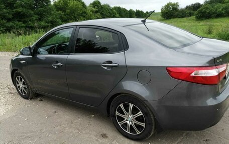 KIA Rio III рестайлинг, 2012 год, 750 000 рублей, 18 фотография