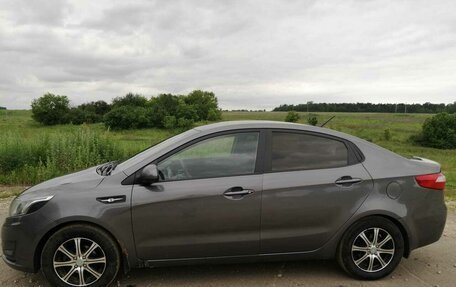 KIA Rio III рестайлинг, 2012 год, 750 000 рублей, 21 фотография