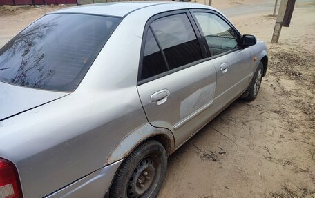 Mazda 323, 2001 год, 230 000 рублей, 4 фотография