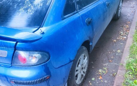 Mazda 323, 1998 год, 180 000 рублей, 6 фотография