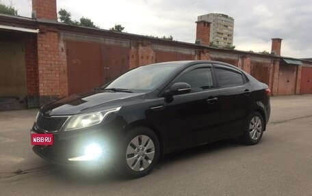 KIA Rio III рестайлинг, 2011 год, 690 000 рублей, 2 фотография
