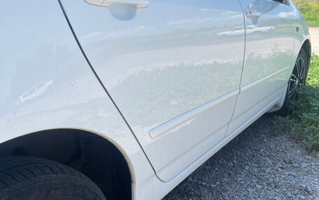 Toyota Corolla, 2004 год, 630 000 рублей, 12 фотография