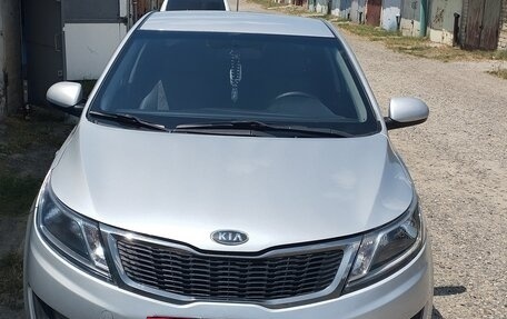 KIA Rio III рестайлинг, 2011 год, 800 000 рублей, 4 фотография