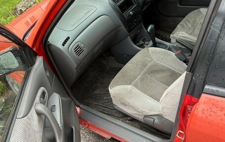 Mazda Familia Y11, 1999 год, 150 000 рублей, 8 фотография