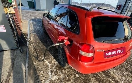 Mazda Familia Y11, 1999 год, 150 000 рублей, 9 фотография