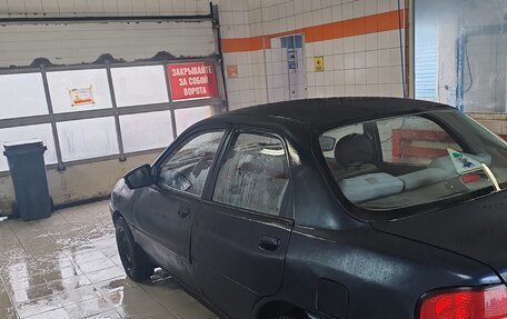 KIA Avella, 1997 год, 135 000 рублей, 3 фотография