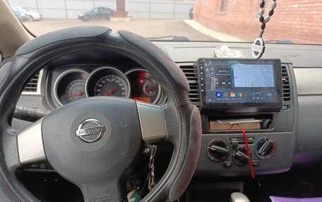 Nissan Tiida, 2011 год, 695 000 рублей, 9 фотография