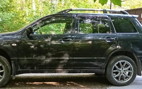 Mitsubishi Outlander III рестайлинг 3, 2004 год, 600 000 рублей, 2 фотография