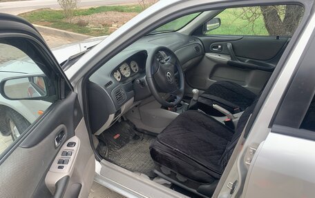 Mazda 323, 2003 год, 600 000 рублей, 8 фотография