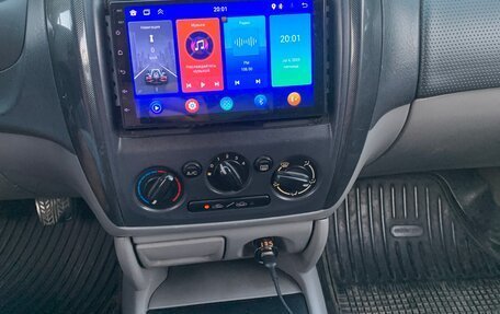 Mazda 323, 2003 год, 600 000 рублей, 12 фотография