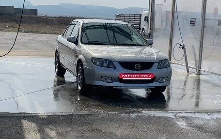 Mazda 323, 2003 год, 600 000 рублей, 10 фотография