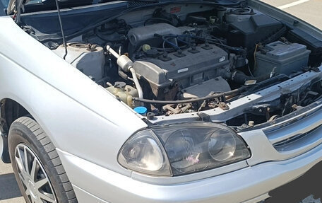 Toyota Avensis III рестайлинг, 2000 год, 455 000 рублей, 33 фотография