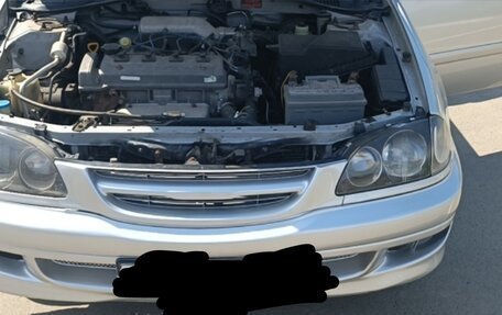 Toyota Avensis III рестайлинг, 2000 год, 455 000 рублей, 32 фотография