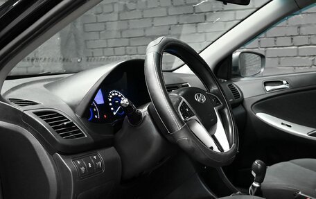 Hyundai Solaris II рестайлинг, 2011 год, 830 000 рублей, 13 фотография