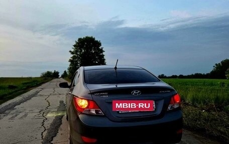 Hyundai Solaris II рестайлинг, 2011 год, 770 000 рублей, 10 фотография