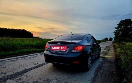 Hyundai Solaris II рестайлинг, 2011 год, 770 000 рублей, 11 фотография